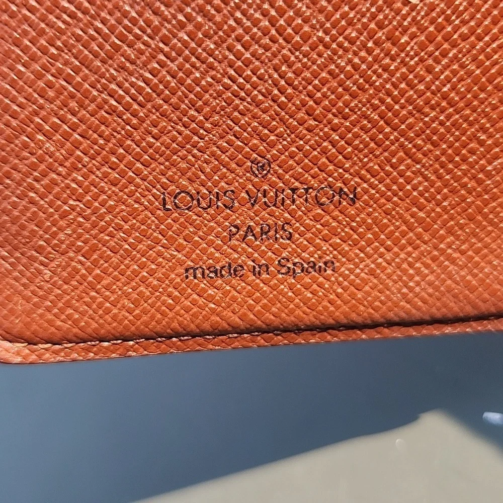 Authentic Louis Vuitton kisslock wallet